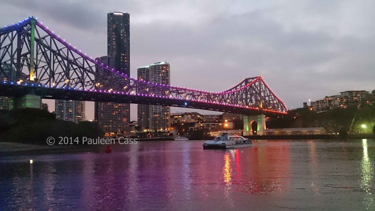 The Story Bridge at sunset, a city cat, and in the distance my school, one of Brisbane's heritage sites.