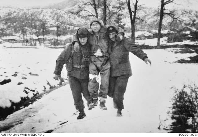 wo members of the 3rd Battalion, The Royal Australian Regiment (3RAR), carry a wounded soldier from the Republic of Korea (ROK) Army along a snow-covered track towards a medical aid post. http://trove.nla.gov.au/work/165106038