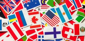 National flags of the different countries of the world in a heap. Top view